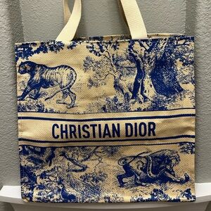 Authentic Brand New novelty CHRISTIAN DIOR Straw Dioriviera Tote in blue.